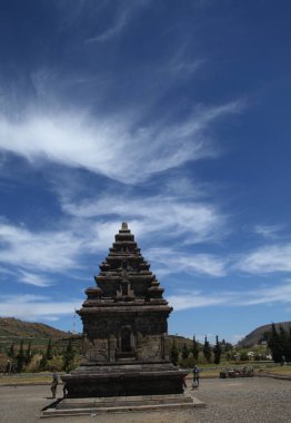 Dieng, Indonesia -March 25 2012: Candi Arjuna Temple is a Hindu temple building located in the Dieng Plateau, Banjarnegara Regency Indonesia. The temple is a historic building made of hewn stone.