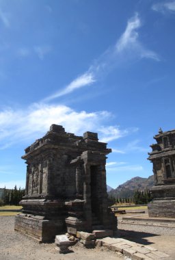 Dieng, Indonesia -March 25 2012: Candi Arjuna Temple is a Hindu temple building located in the Dieng Plateau, Banjarnegara Regency Indonesia. The temple is a historic building made of hewn stone.