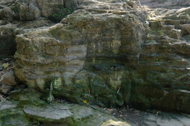 rocky cliff of the river in the mountains