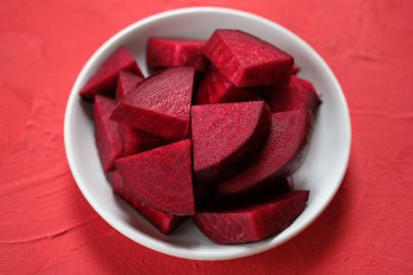 sliced beets on white plate 