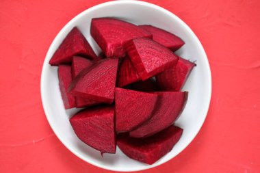 sliced beets on white plate 