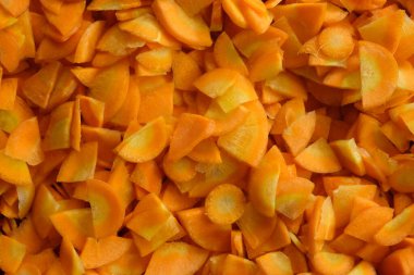 sliced fresh yellow carrots background