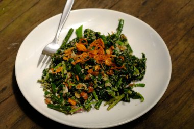 Lawar Bali is boiled green vegetables