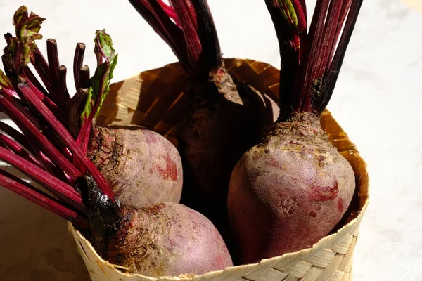 close up of fresh beetroots in a basket