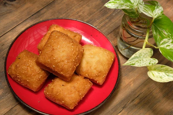 stock image Odading or Galundeng is a traditional sweet made from flour and sugar in deep fried. Indonesian food.