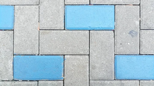 Close up of paving stones in blue and gray