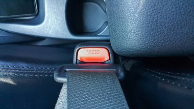 Close up of safety belt lock catch. Lock car seatbelt.