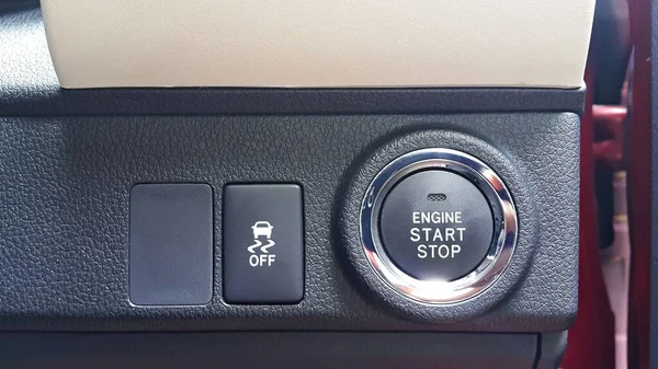 Engine start stop button and traction control button of the car