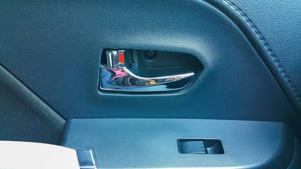 Door handle inside the car with the door lock open