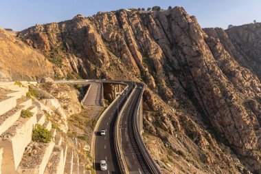 Aerial view of rocky mountains with highway in Taif city, Saudi Arabia clipart