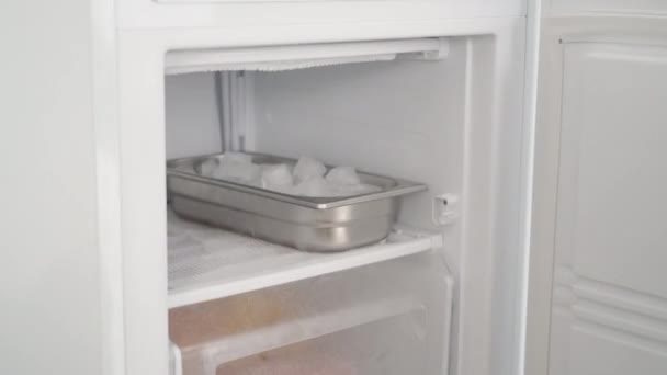 Man Takes Ice Cubes Freezer Puts Them Glass Cold Drink — Wideo stockowe