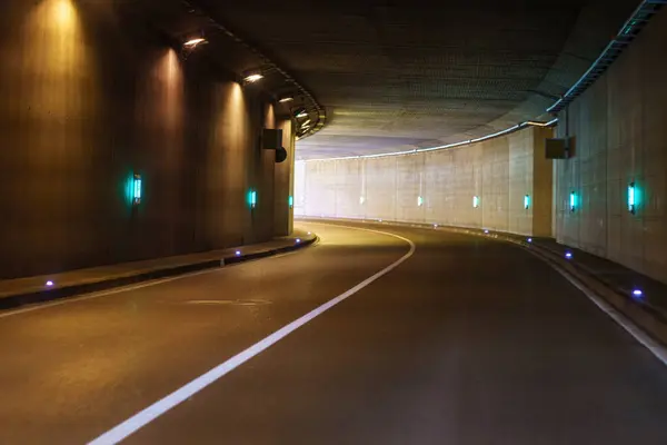 stock image An empty road tunnel on a highway with no cars.