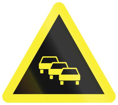 Çin 'de yol işareti - Trafik sıkışıklığına dikkat edin.