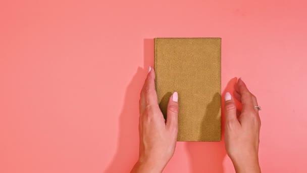 Women Fingers Reveal Blank Copy Space Golden Vintage Hardcover Book — стоковое видео