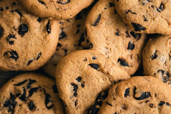 Close up, chocolate crisp cookies, mako shot, food background, top view.