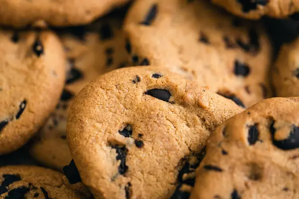 Close up, chocolate crisp cookies, mako shot, food background, top view.