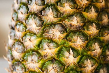 Makro ananas, yakın çekim kabuk dokusu, doğal gıda arka planı..