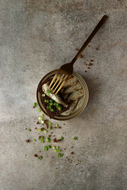 Canned conserves sprats sardines in oil trend food background