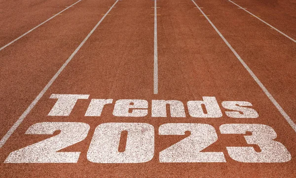 Trends 2023 written on running track, New Concept on running track text in white color
