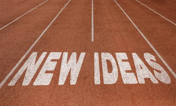 New Ideas written on running track, New Concept on running track text in white color