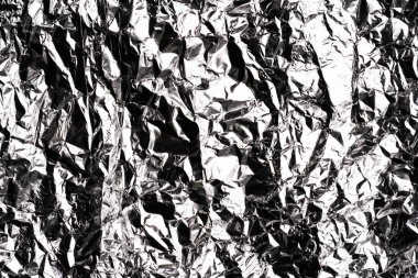 Renkli folyo arka plan, dokunun arka planı için parlak buruşuk yüzey. Soyut parlak arkaplan.