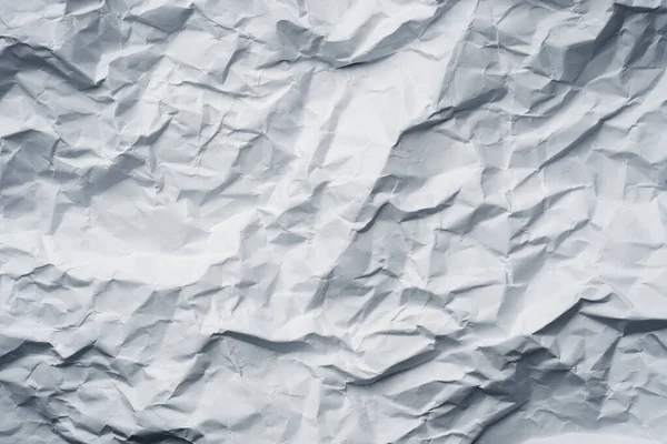 white crumpled paper texture background. Clean white paper, wrinkled, abstract background.