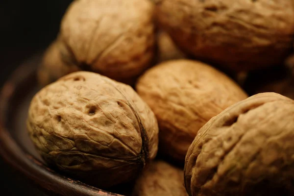 Stock image Walnut close up on a wooden table. Walnut close up. product rich in minerals and vitamins.