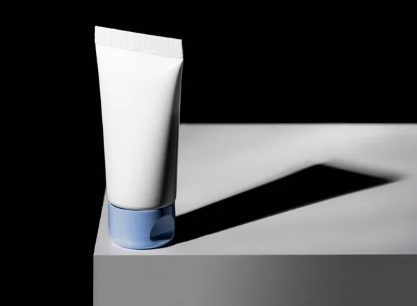 White tube of cosmetic product on a black background. Skin care lotion swatch with white cosmetic creamy texture. Moisturizing face cream, hair conditioner. Shampoo, balm.