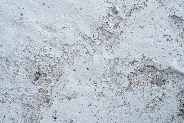 背景の古い灰色のコンクリート壁の質感 傷や亀裂の壁の断片 — ストック写真