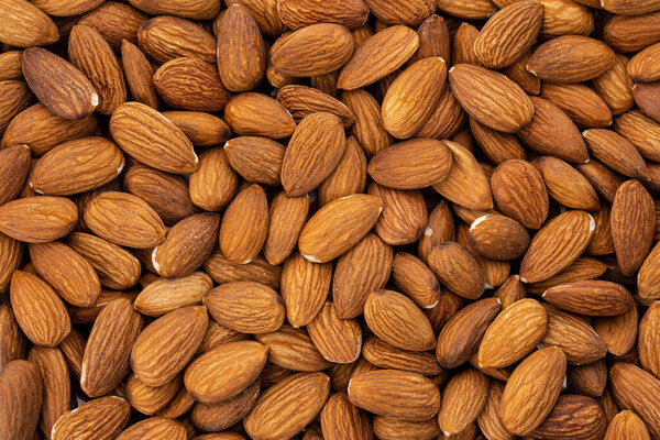 Almond nuts close up. Nut almond close up. Product rich in minerals and vitamins.  Almond kernels. Texture of Almond kernels.