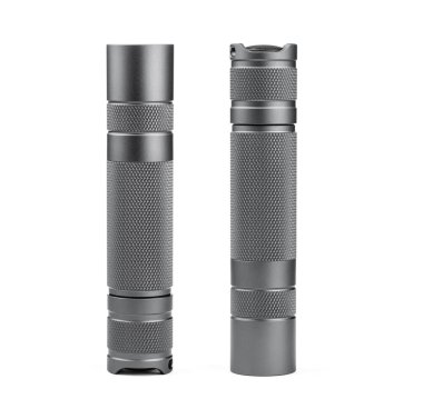 Modern aluminum LED Pocket Flashlight isolated on white background.