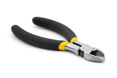 Beyaz arka planda sarı kesiciler. Yan kesme aracı.