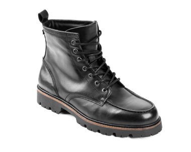 Pair of black leather boots, dress boots for men, men ankle high boots. Black brogue boots on a white background. Men fashion in leather boots. Man's legs in black jeans and brown leather boots.