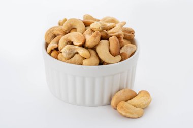 Kaju fıstığı. Bitki bazlı malzeme. Kurutulmuş fındık. Makro atış. Çiğ çerez. Kabuksuz kaju fıstığı. Bütün çekirdekler. 