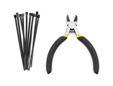 Beyaz arka planda sarı kesiciler. Yan kesme aracı.