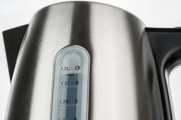 electric kettle. Electric kettle rotates on a white background