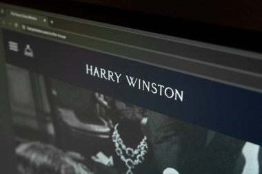 Dnipro, Ukraine 11.03.2024: The homepage of the official website for Harry Winston - fashion house. Homepage of Harry Winston website on the display of PC. Harry Winston logo on the website.  clipart