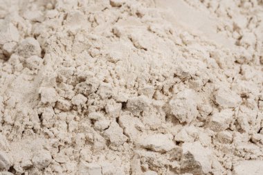 Ölçüm kaşığında protein tozu. Vücut geliştirme, fitness ve spor salonunda yaşam tarzı. Spor, sağlık ve beslenme kavramı