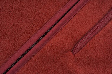 Örtü kumaş dokusu ve iç ya da arka tarafı, arka plan ya da arka tarafı. Giysiler, dikiş. Sahte kürk. Kürk yapısı olan bir arkaplan.