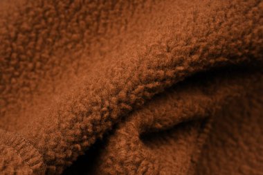 Örtü kumaş dokusu ve iç ya da arka tarafı, arka plan ya da arka tarafı. Giysiler, dikiş. Sahte kürk. Kürk yapısı olan bir arkaplan.