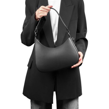 Kadınların siyah deri çantaları beyaz arka planda izole edilmiş. Modaya uygun kadın aksesuarları. Modern aksesuarlar. Zarif minyatür kadın çantası..