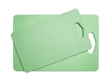 Kesme tahtası. Beyaz arka planda plastik bir pano. Mutfak eşyaları.