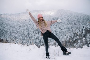 Young Woman playing with snow Outdoor Winter Lifestyle happiness emotions nature on background