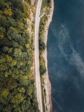 Aerial Drone Photograph of Dhrontalsperre Lake Surrounded with Beautiful Autumn Colors of the Forest  clipart