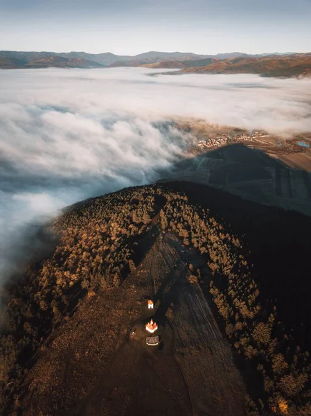 stock image Romano Catholic chapel at Perko Sanzieni village, Covasna county Romania, Transylvania. Captured from above with drone at sunrise 