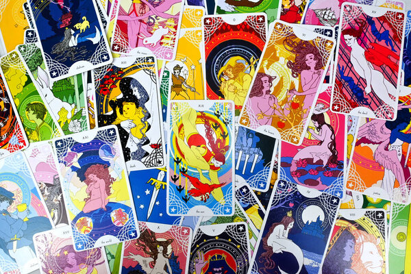Bangkok, Thailand, 20 Jan 2023, tarot cards spreading flat lay, Star spinner tarot deck, major arcana, the moon, the world, wheel of fortune, the lovers, magician, death, occultism, tarot closeup