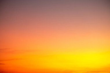 Beautiful gradiant orange clouds and sunlight on the blue sky perfect for the background, take in everning,Twilight, rainy season,winter, summer