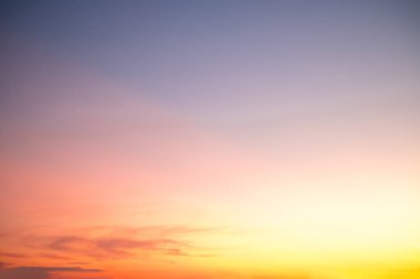 Beautiful gradiant orange clouds and sunlight on the blue sky perfect for the background, take in everning,Twilight, rainy season,winter, summer