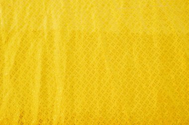 Sarı çarşaf deseni bulanık eğri tarzı soyut lüks kumaş, kırışık çarşaf ve altın rengi gölgeler, arka plan.