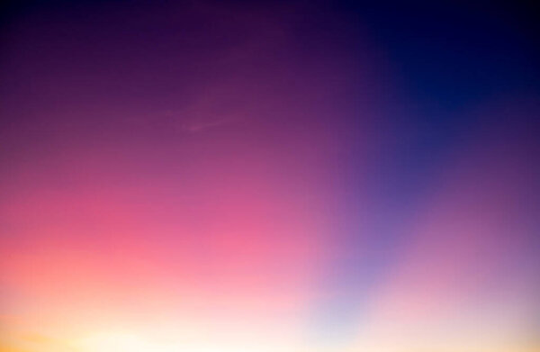 Real amazing Beautiful sunrise and luxury soft gradient rainbow clouds with sunlight on the golden pinkgold sky perfect for the background, take in everning, Twilight sunset sky with gentle colorful clouds, pastel gradient